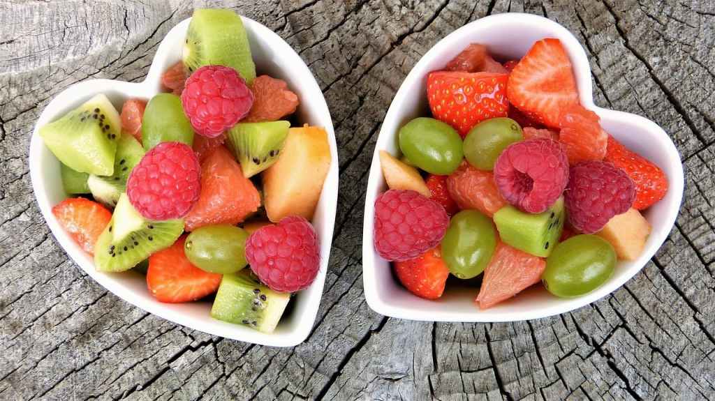 two bowls of fresh fruit for good gut health